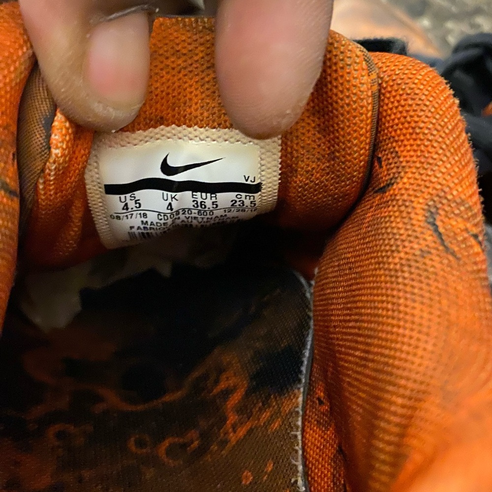 Orange and black camo boys air max